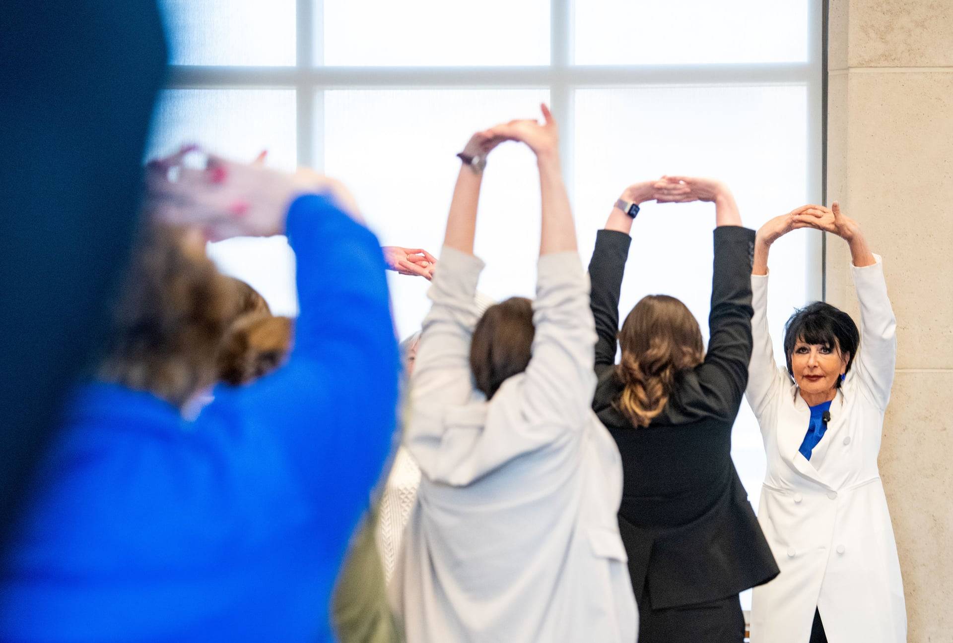 President Mantella and audience stretching